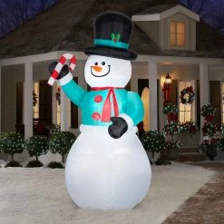 Gemmy Airblown Inflatable Snowman with Candy Cane 5 Gemmy Airblown Inflatable Snowman with Candy Cane -Gemmy Online Store 1572768 A1